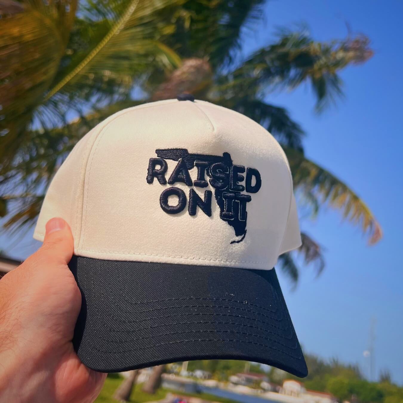 Raised On It | Florida Logo | Embroidered Trucker Hat