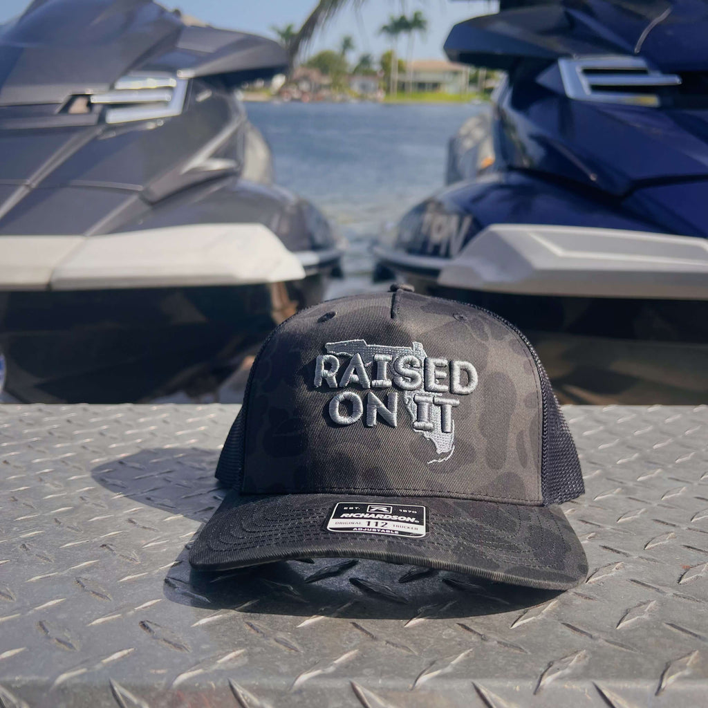 Raised On It | Florida Logo | Embroidered Trucker Hat