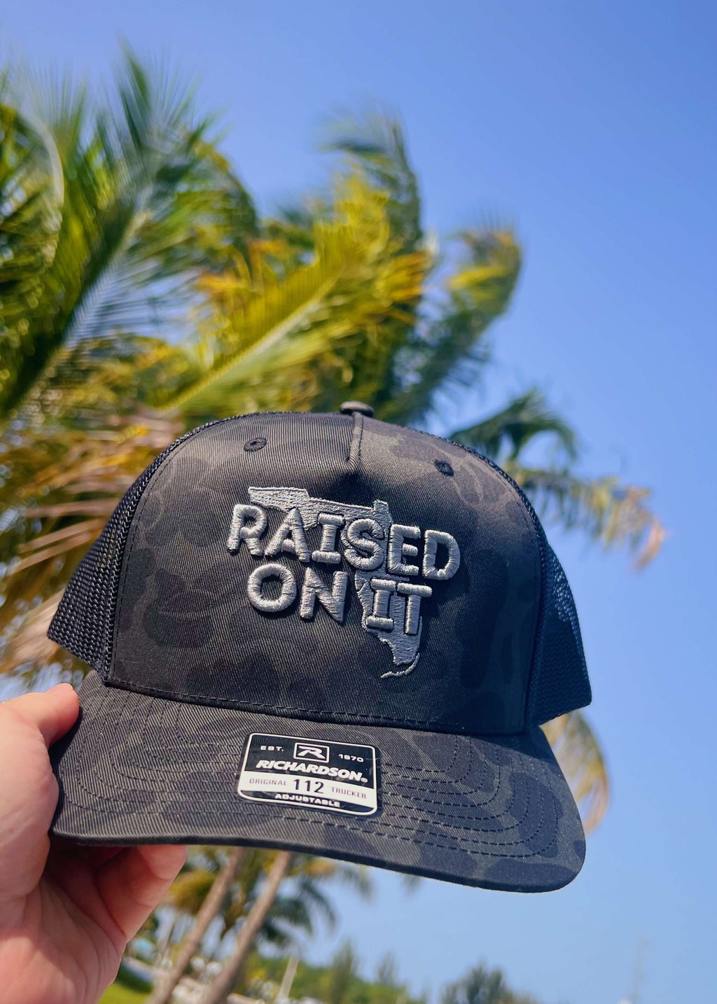 Raised On It | Florida Logo | Embroidered Trucker Hat