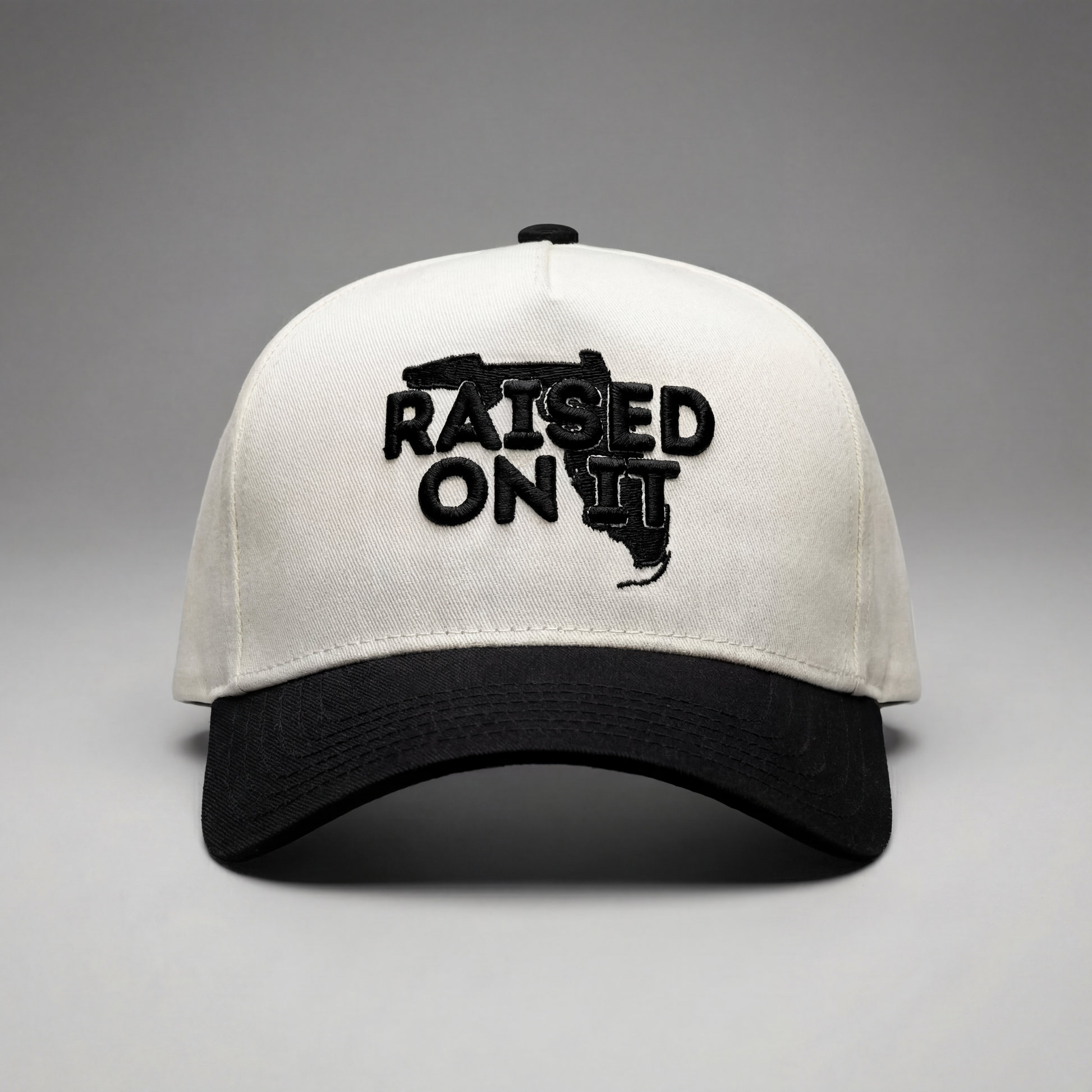 Raised On It | Florida Logo | Embroidered Trucker Hat